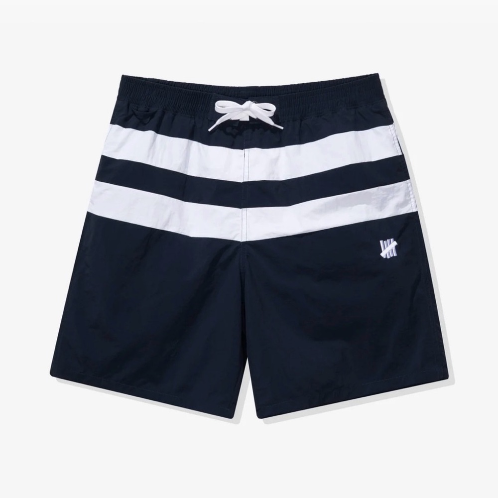 UNDEFEATED STRIPED SWIM SHORTS